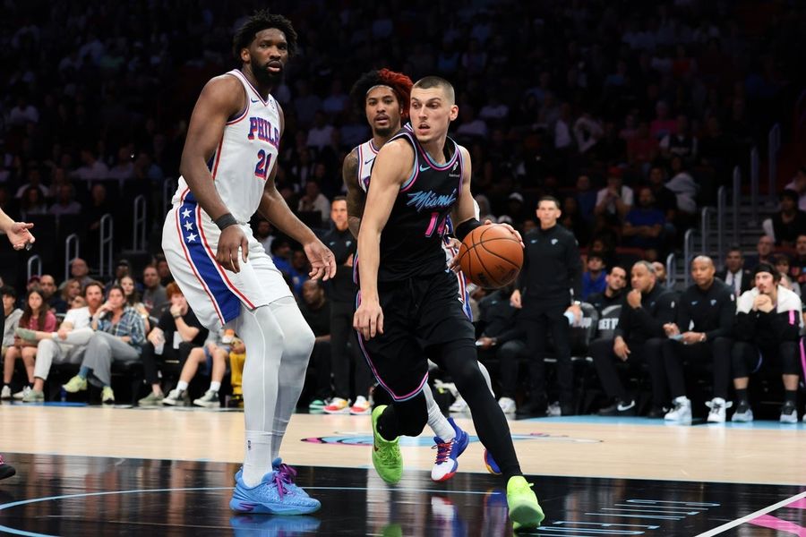 Heat use late 14-0 run to push past 76ers